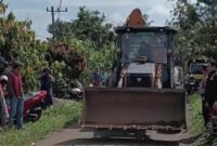 Foto: Alat Berat menuju lokasi perkara, di Nagari Sungai Kamuyang, Kecamatan Luak Kabupaten Lima Puluh Kota pada Kamis 18 Juni 2026